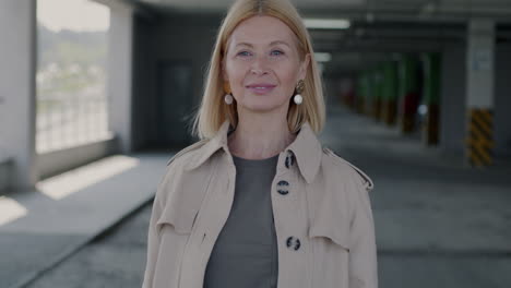 smiling woman in a parking garage
