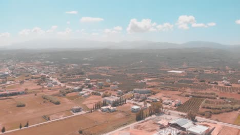 drone panning over greek city