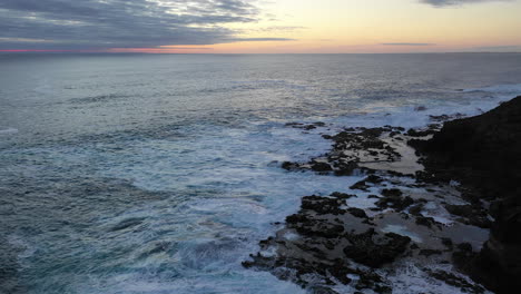 Drone-flight-over-the-rocky-coastline-of-Cape-Schank,-Australia