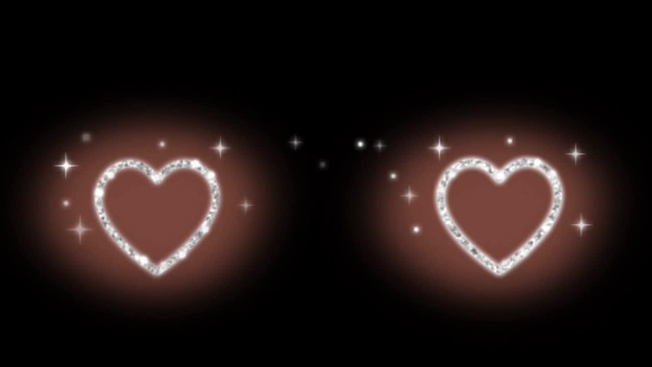 애니메이션 핑크색 심장 모양이 검은색 배경에 떠다니고 있습니다.
