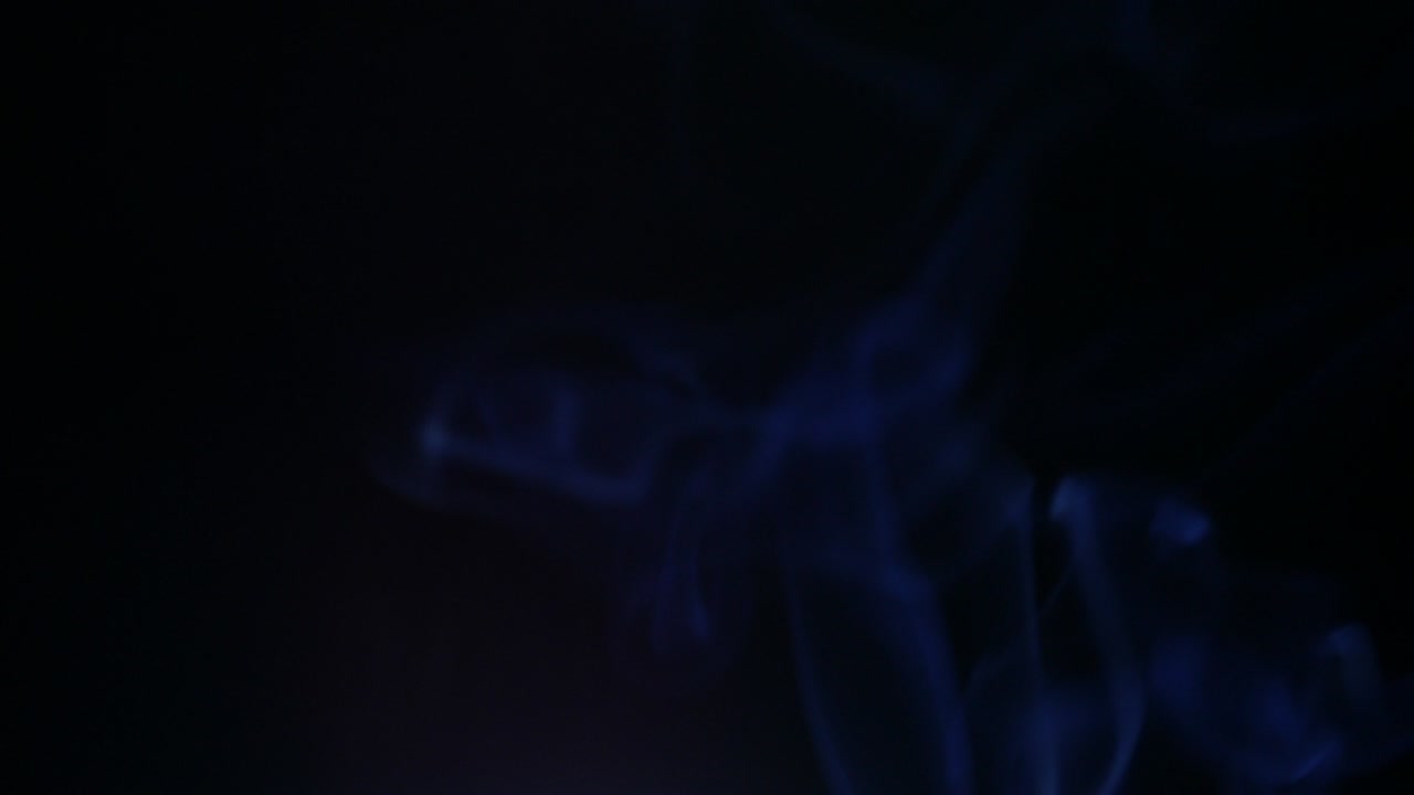 Colors smoke in dark background