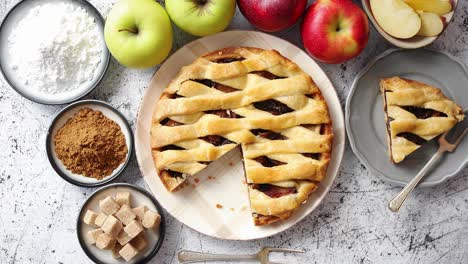 delicious apple pie cake with a fresh fruits  brown and powder sugar