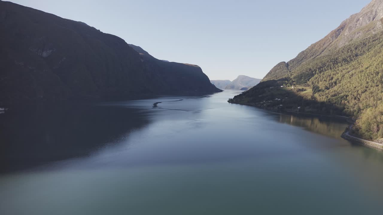 Beautiful panorama of Lusterfjorden fjord in Norway with turquoise water and surrounding mountains. Drone footage