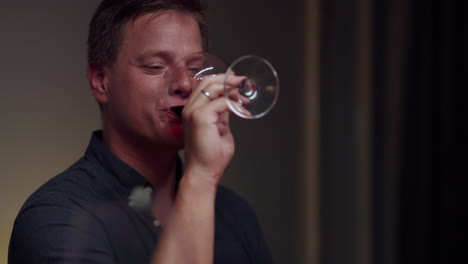 A man drinking wine