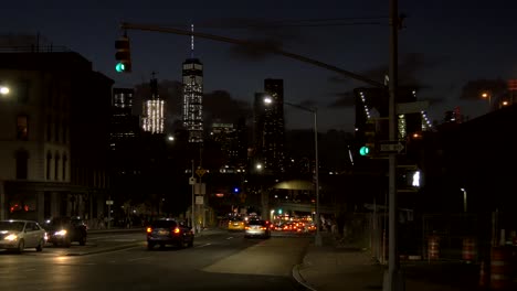 traffic moving around new york at night