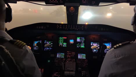 jet cockpit view from inside in a heavy fog condition in the ramp before starting push-back maneuver