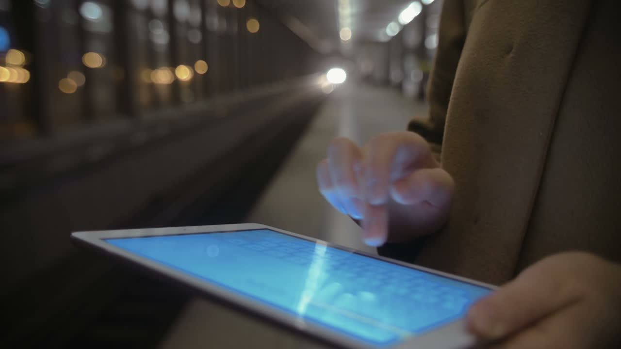 Woman Writing Letters on Tablet