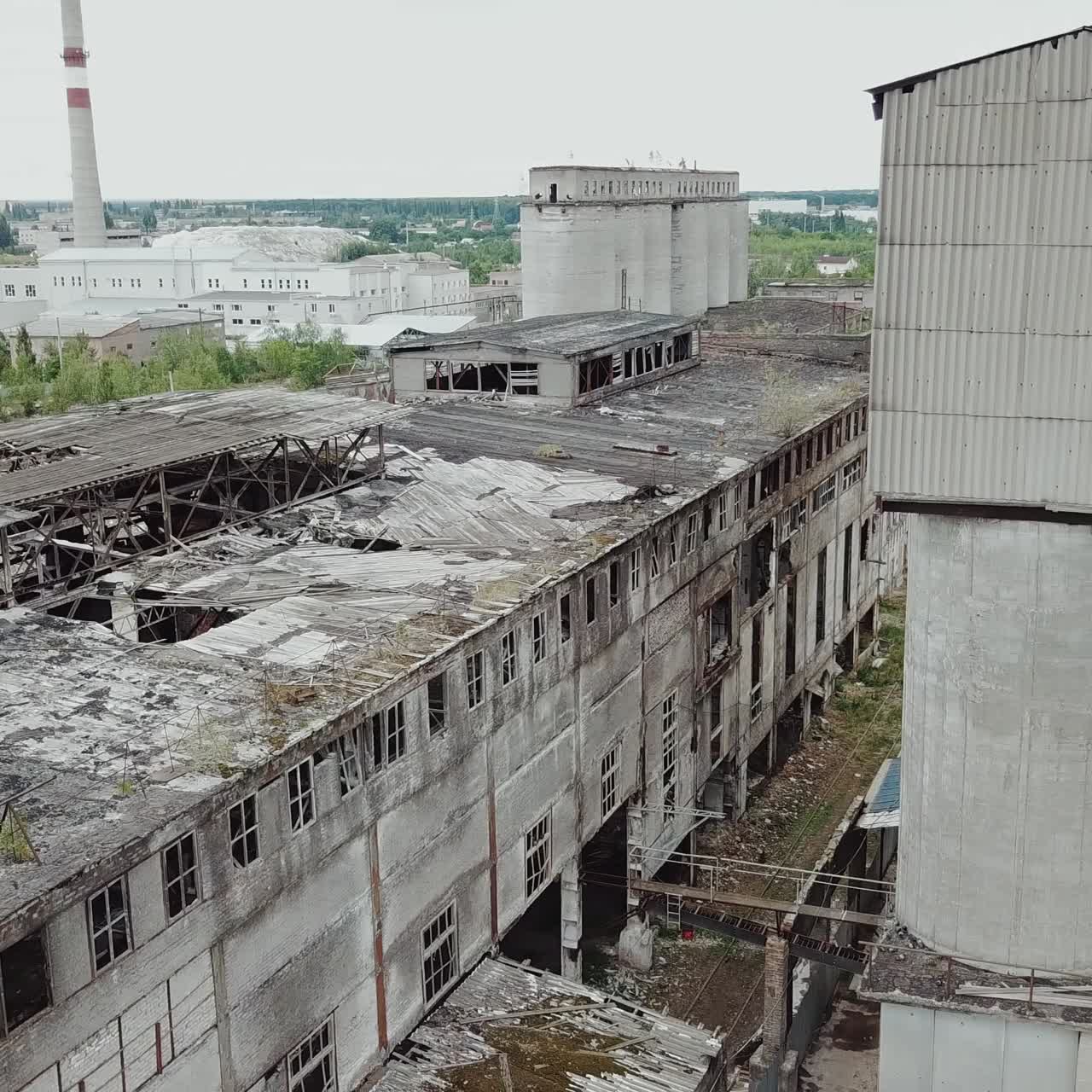Abandoned ruined industrial factory building, ruins and demolition concept. Aerial view