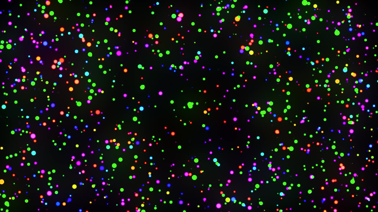 Colorful particles shining in rainbow colors. 4K loop playback compatible material