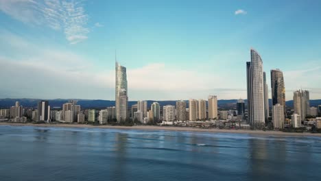 Reversing-aerial-of-Surfers-Paradise-skyline,-Gold-Coast,-Queensland,-Australia-20230502