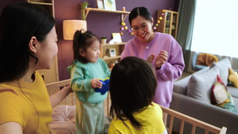 asian babies in a crib