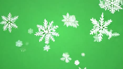 copos de nieve cayendo en la pantalla verde