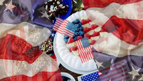 animation of usa flags over cakes and desserts