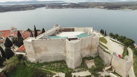 point of drone view around saint michael fortress and sibenik aquatorium panoramic view