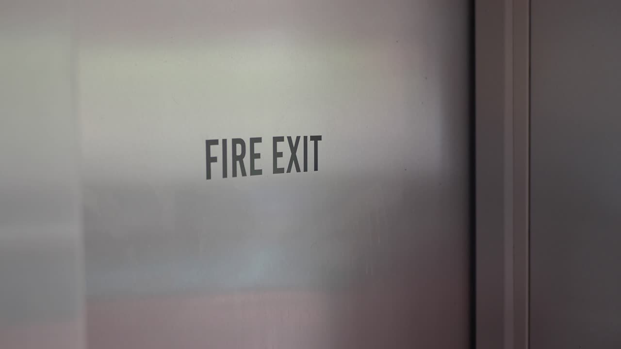 Fire Exit Sign on a Metal Door