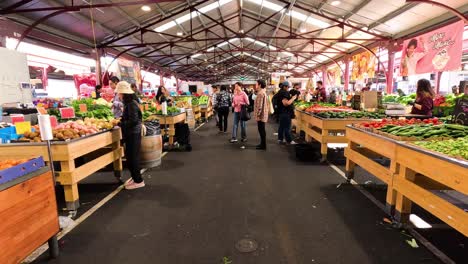 people shopping at a bustling market