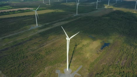 aerial view of wind turbines energy production- 4k drone footage turbines