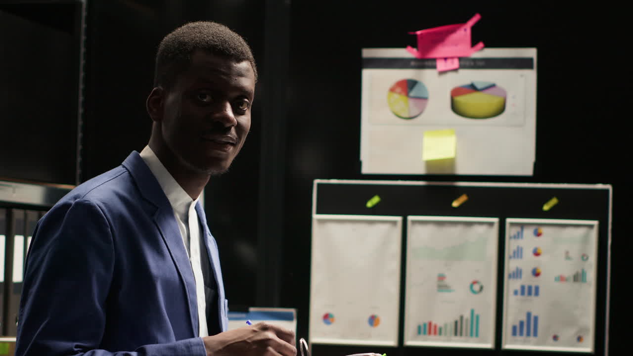 African American businessman analyzing financial data