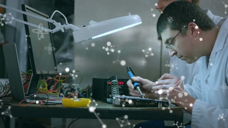 Animation of white molecules over male scientists