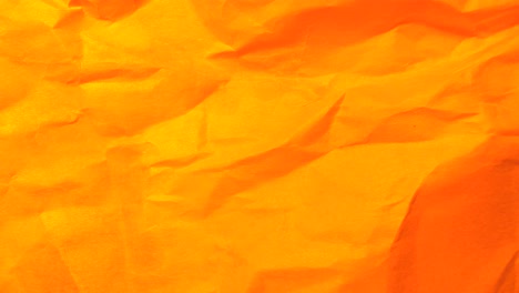orange crumpled paper texture background