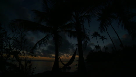 puerto rico zonsopgang met hangmat en palmbomen
