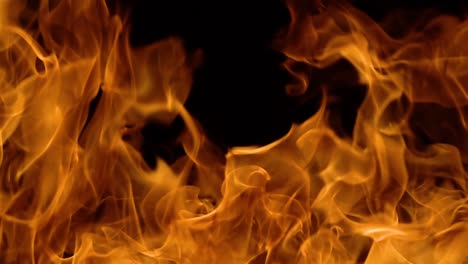 Flames-of-fire-on-black-background-in-slow-motion