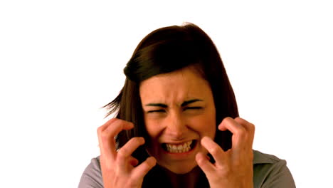 Angry-brunette-shouting-on-white-background