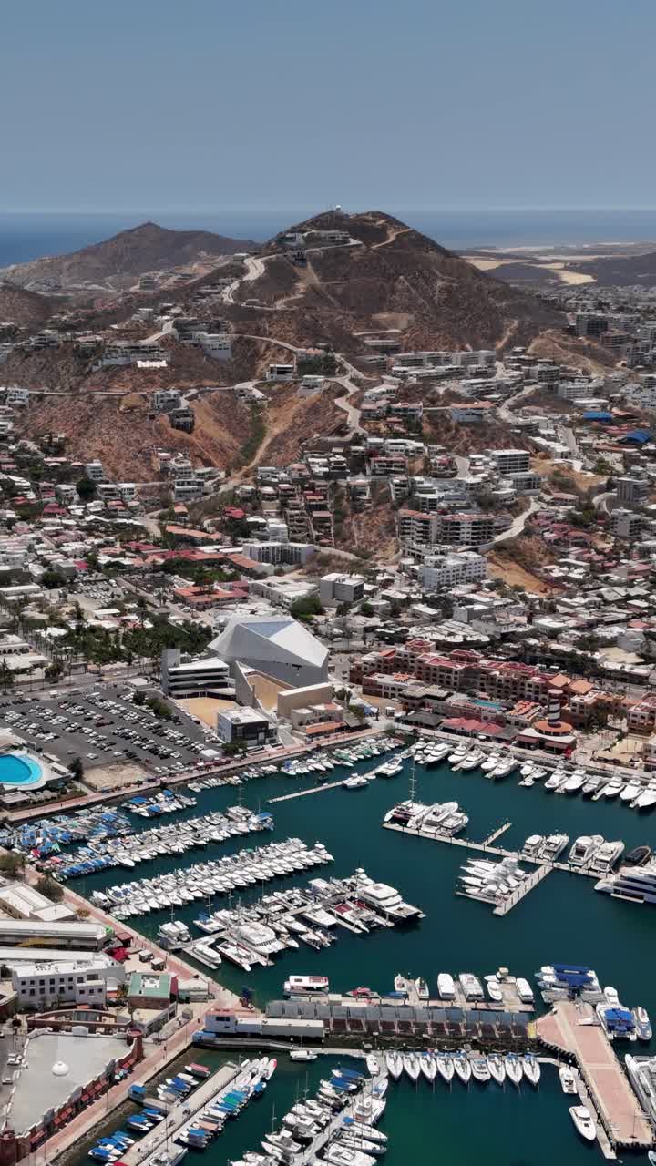 Vertical Drone Shot of Cabo San Lucas, Mexico. City Harbor Marina and Buildings