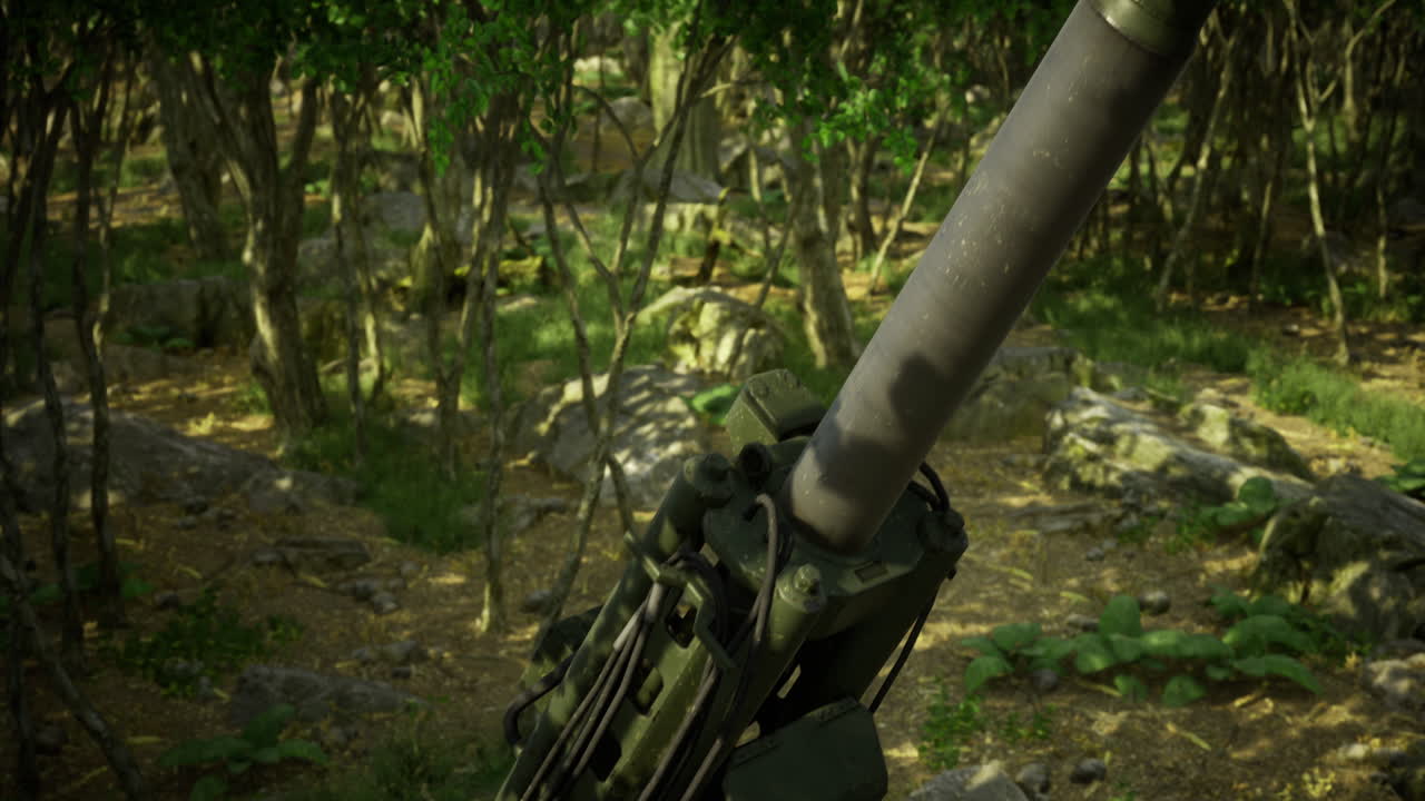 Military mortar positioned among trees in a dense forest environment