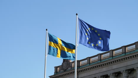 Swedish-and-European-Union-Flag-Fluttering-in-the-Wind