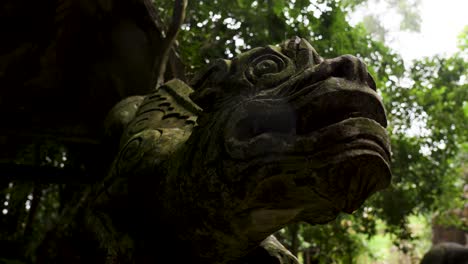 close-up shot of an asian dragon stone sculpture at tarnim magic garden