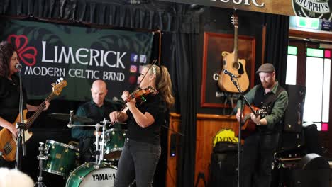 musicians playing in a lively band setup