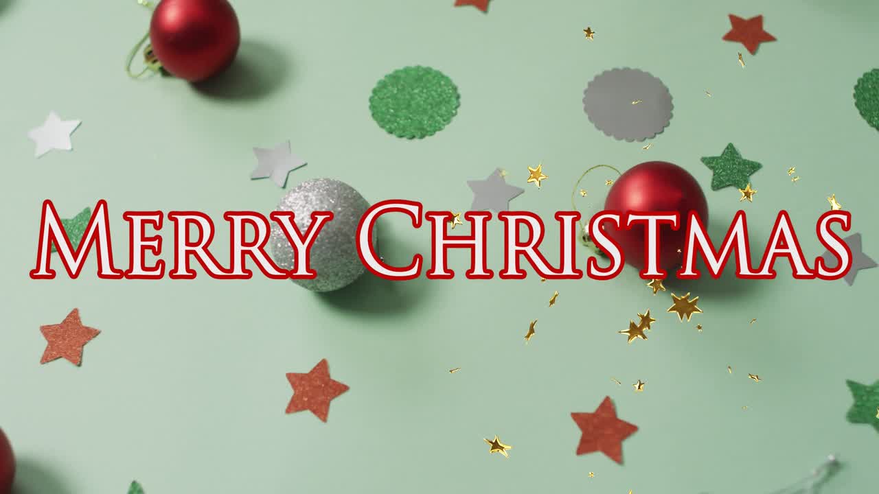 animación de texto de feliz navidad sobre decoraciones en fondo verde claro