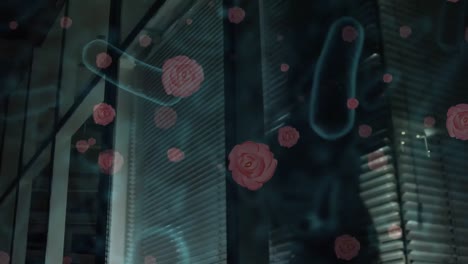 animation of flowers and cells over shadow of businessman in cabin at office