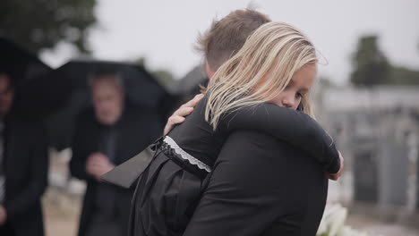 sad, death and a girl with her father at a funeral