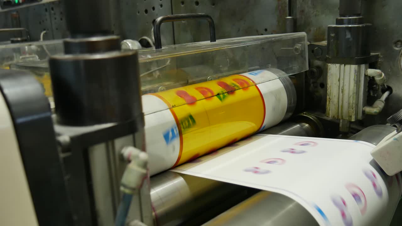 printing press working at high speed. machine printing labels for products industrialization for chain work