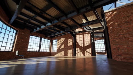 empty industrial loft with brick walls, large windows, and sunlit interior