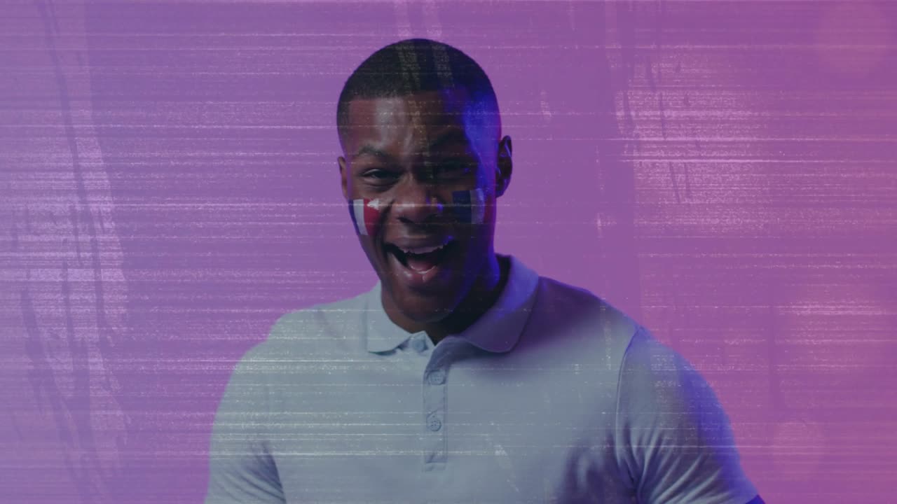 On cue man holding soccer ball, reacting and showing sports pride scanlines overlaying frame
