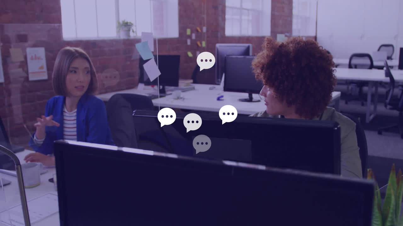 Animation of network of speech bubbles over diverse business people in office
