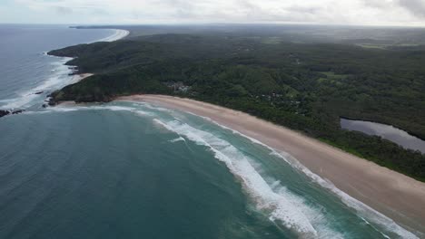 headland and ocean, broken head beach in byron bay, nsw, australia - aerial drone shot