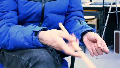 person practicing drums