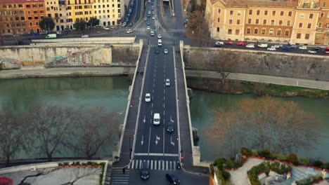 cars crossing the river tiber