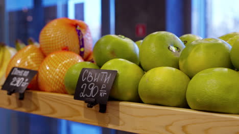 fresh fruits on display at a grocery store