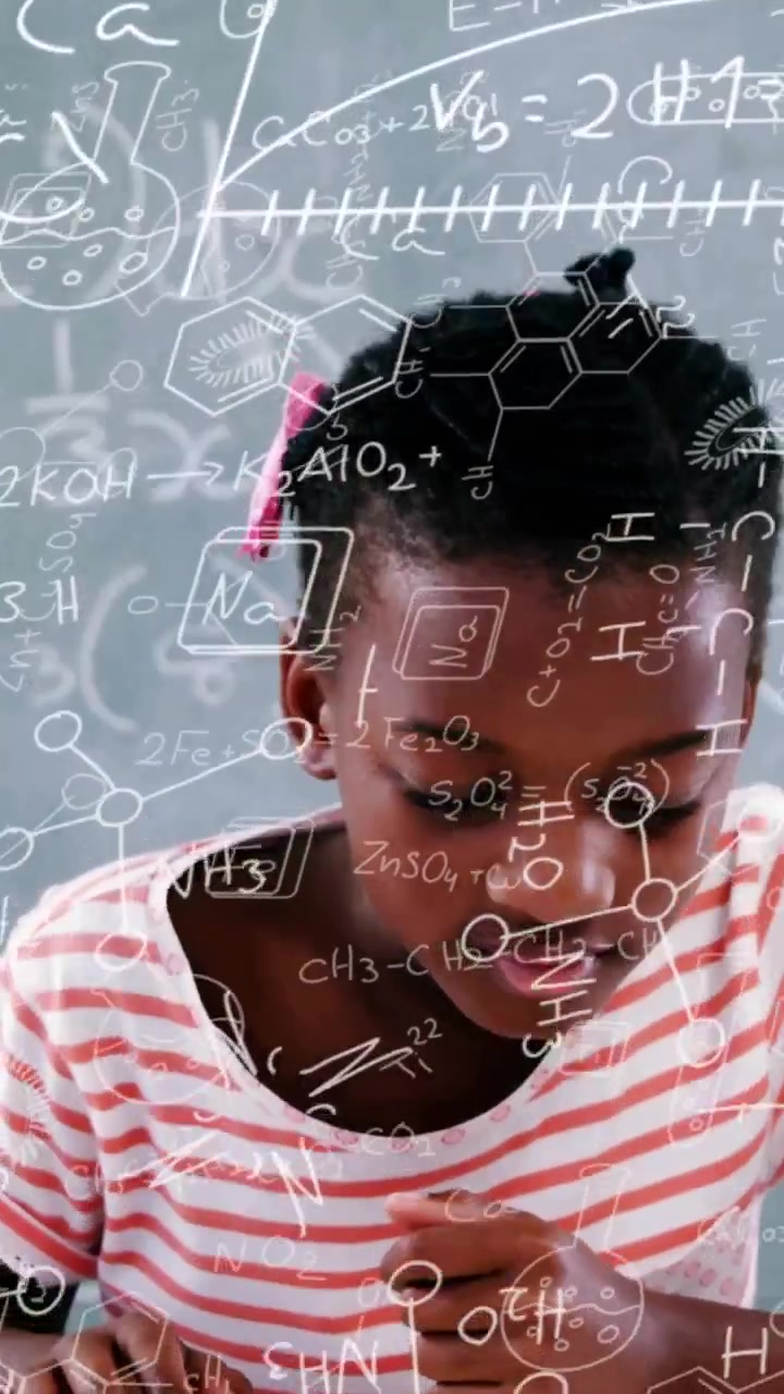 Vertical video: Girl opening textbook and studying chemistry, pencil tracing while formulas overlay