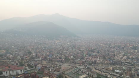 drone shot of foothills in kathmandu, nepal at the base of the himalayas