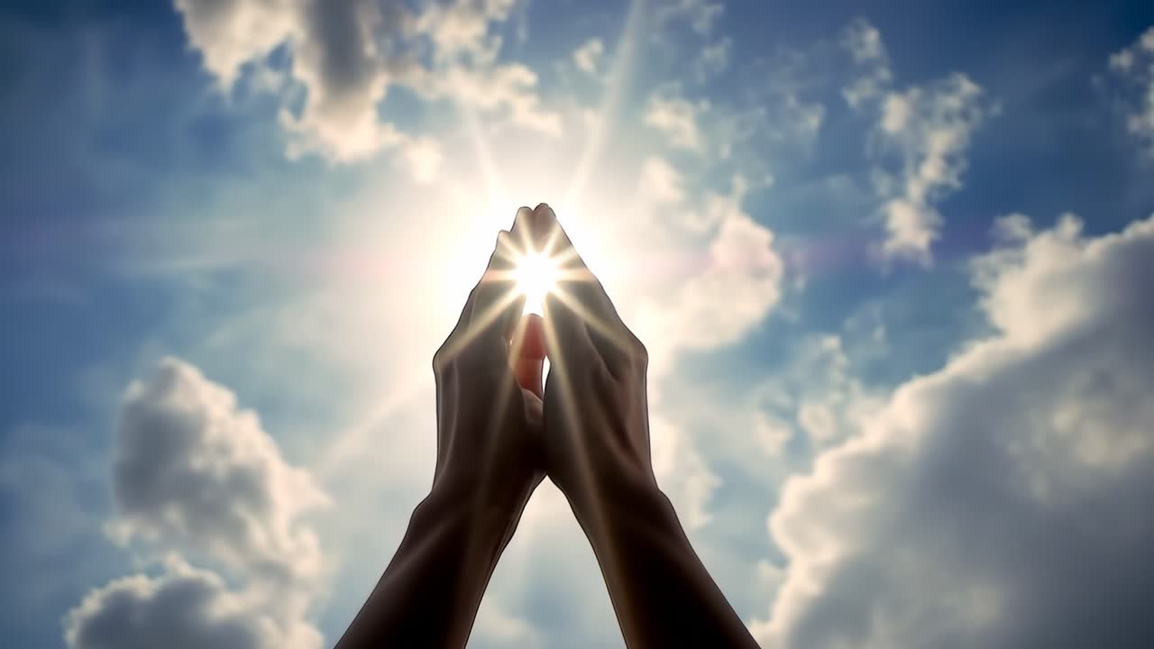 Hands reaching towards the sun in a dramatic upward angle, capturing the essence of hope and light