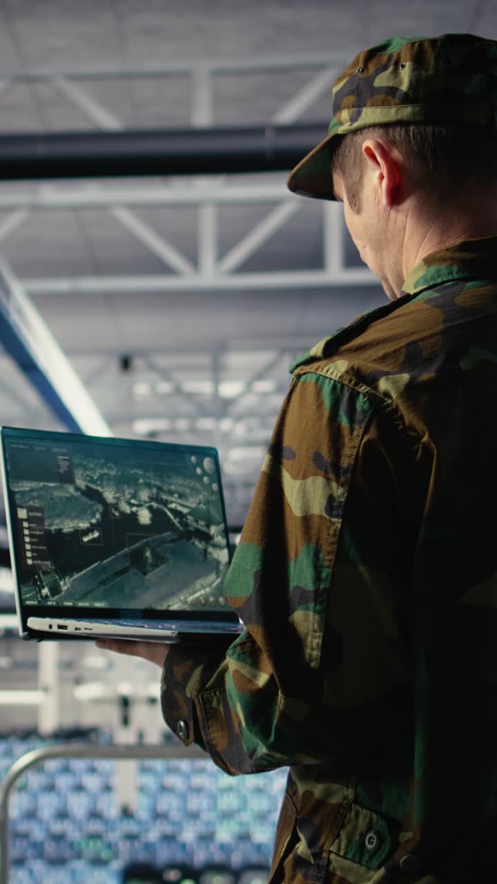 Vertical Video Military Data Center Expert Using Ballistic Missiles Radar On Laptop