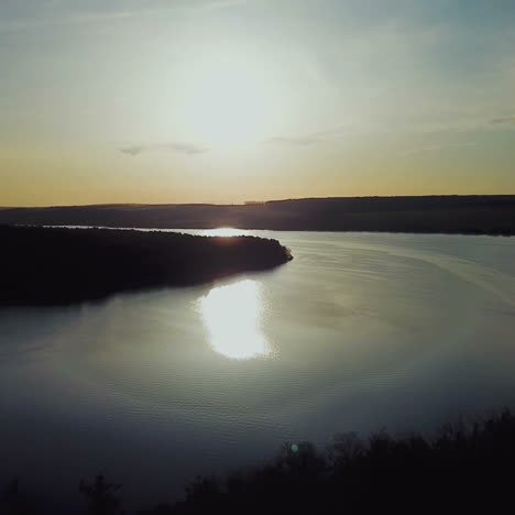 wonderful view of the river with forest on both banks at sunrise. aerial landscape.