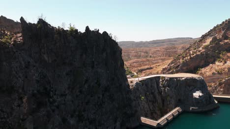 mountain with rugged terrain at oymapinar dam over manavgat river in antalya province, turkey