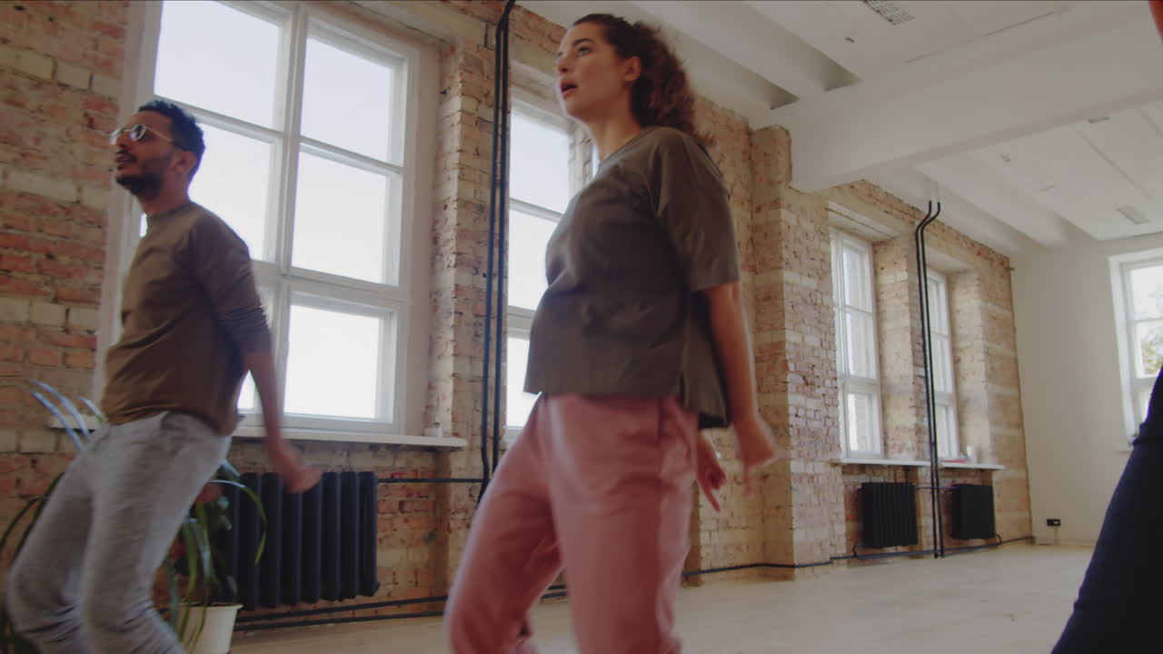 Young Multiethnic People Taking Dance Class in Studio